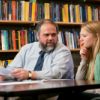 Martin Wells and a student looking over a paper.